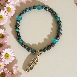 Hand Crafted Blue and Brown Beaded Bracelet with Feather Charm